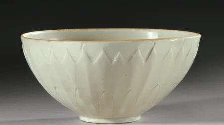 A family bought a small white bowl for $3 at a yard sale in upstate New York in 2007 and kept it on 