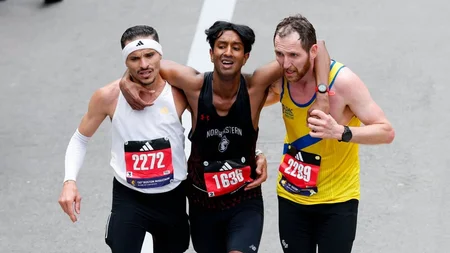 Ajay Haridasse collapsed 1,000 feet from the Boston Marathon finish line with severe cramps. Two str