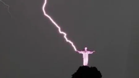 Christ the Redeemer towers over Rio de Janeiro with its arms outstretched. Lightning strikes it 3 to