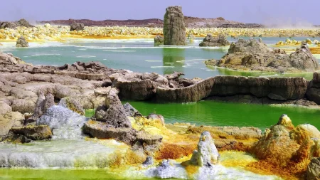 The Dallol springs in Ethiopia glow neon yellow and acid green - and their pH drops below zero, lowe