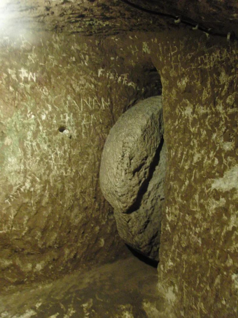Massive circular rolling stone door inside Derinkuyu underground city
