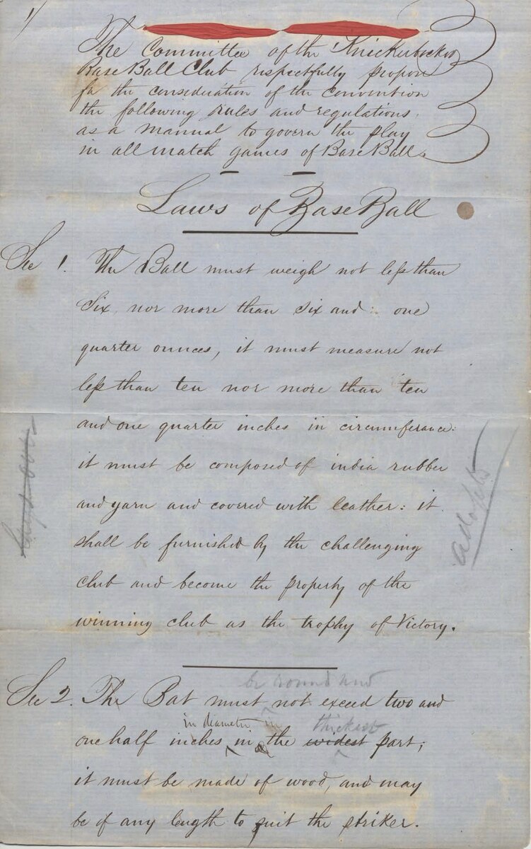 A page of the handwritten 1857 Laws of Base Ball manuscript drafted by Daniel Doc Adams, showing aged paper with 19th-century cursive ink handwriting laying out baseball rules, photographed flat against a plain background