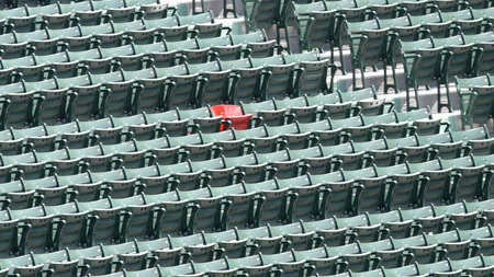 Fenway Park's right-field bleachers are all green, except one. That single red seat marks a home run