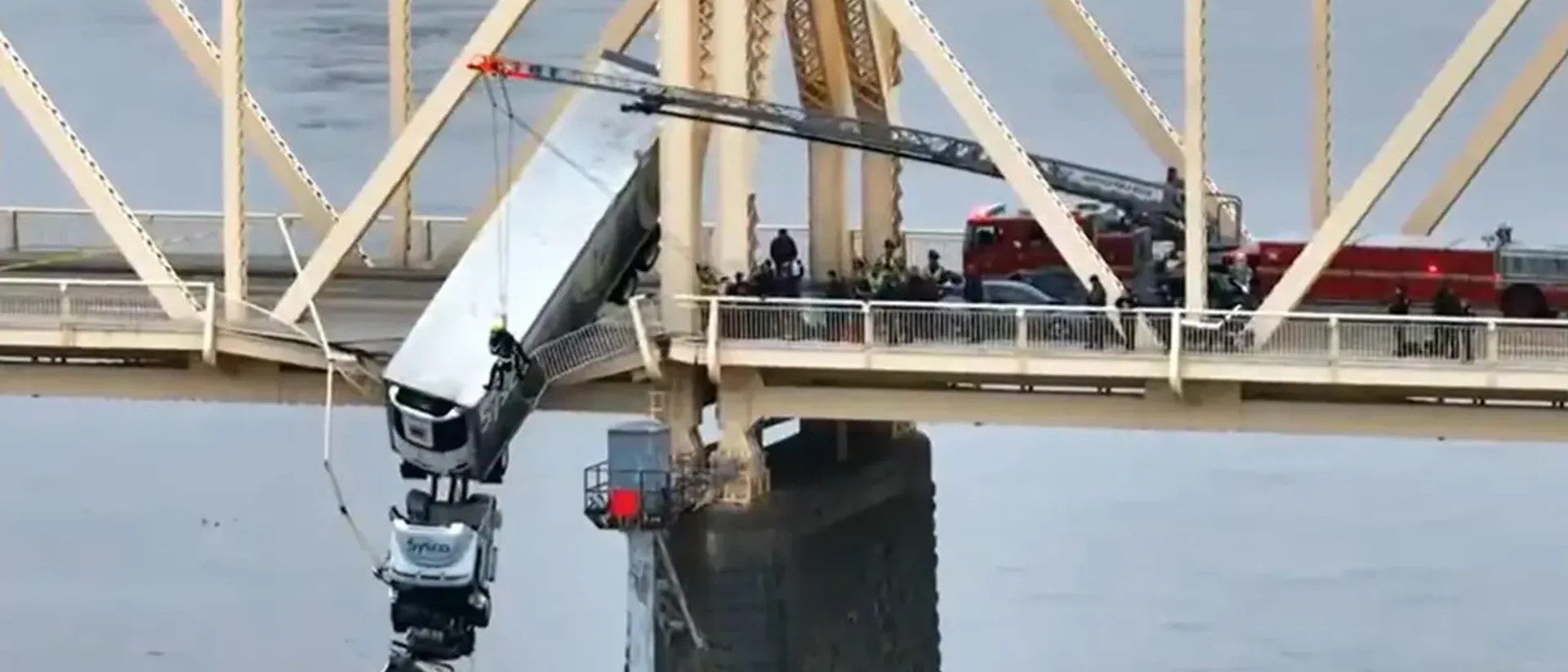 Firefighter Rappelled Off a Bridge to Save a Trucker Dangling 100 Feet Over the Ohio River