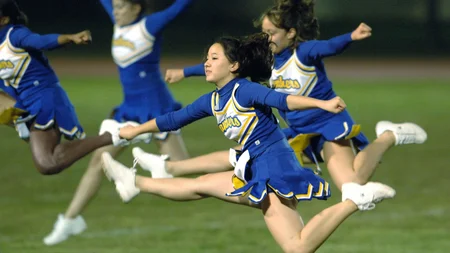 The Herkie is the cheer jump: one leg kicked straight out, the other bent back. It started as a flub