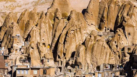 Kandovan’s cone-shaped homes are carved from volcanic rock—and people still live inside them.