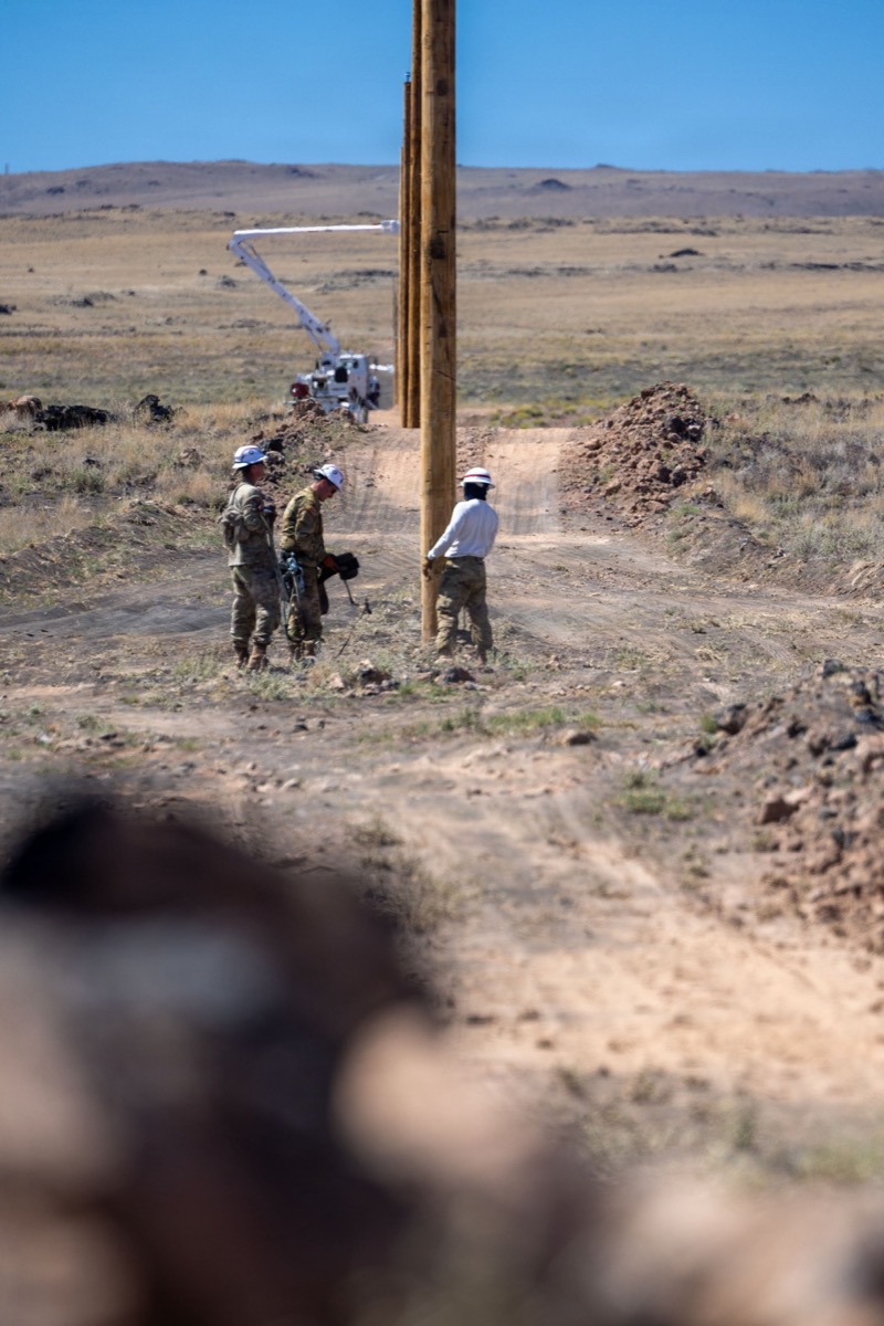 U.S. Army Reserve engineers from the 249th Engineer Battalion Prime Power installing power distribution poles near Winslow, Arizona for Light Up Navajo, May 2026