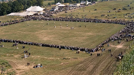 A cornhusking contest was a race to strip corn by hand, timed to the minute. In 1935, one of those c