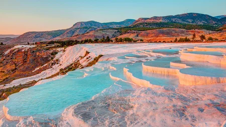 Pamukkale in southwestern Turkey means Cotton Castle, and it looks like snow that never melts. Hot s