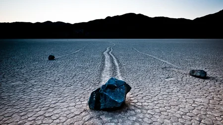 At Racetrack Playa in Death Valley, rocks weighing up to 700 lbs slide across cracked mud on their o