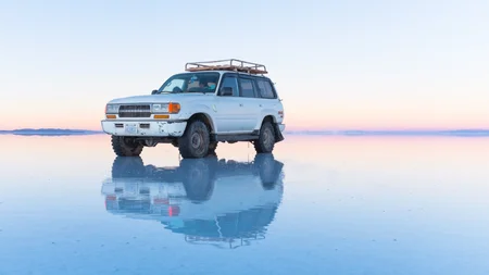 Bolivia's Salar de Uyuni is the world's largest mirror. Once a year, seasonal rain covers 10,582 squ