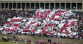 Yale Students Got Harvard Fans to Hold up Sign Saying: "WE SUCK"